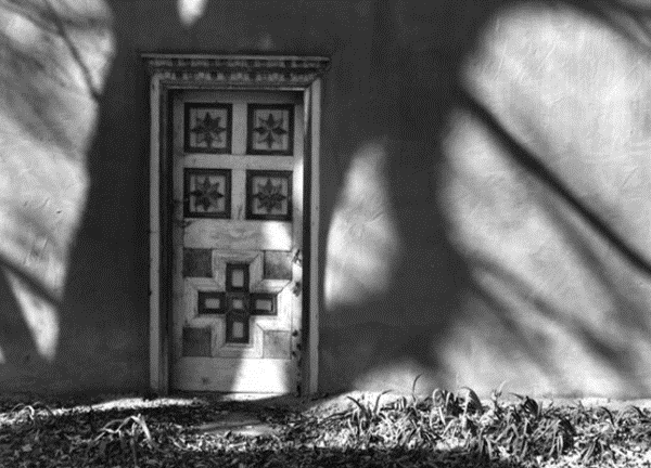 Hispanic Folk Art Door to Storehouse at Los Luceros - Photo by Arthur Lazar 1974