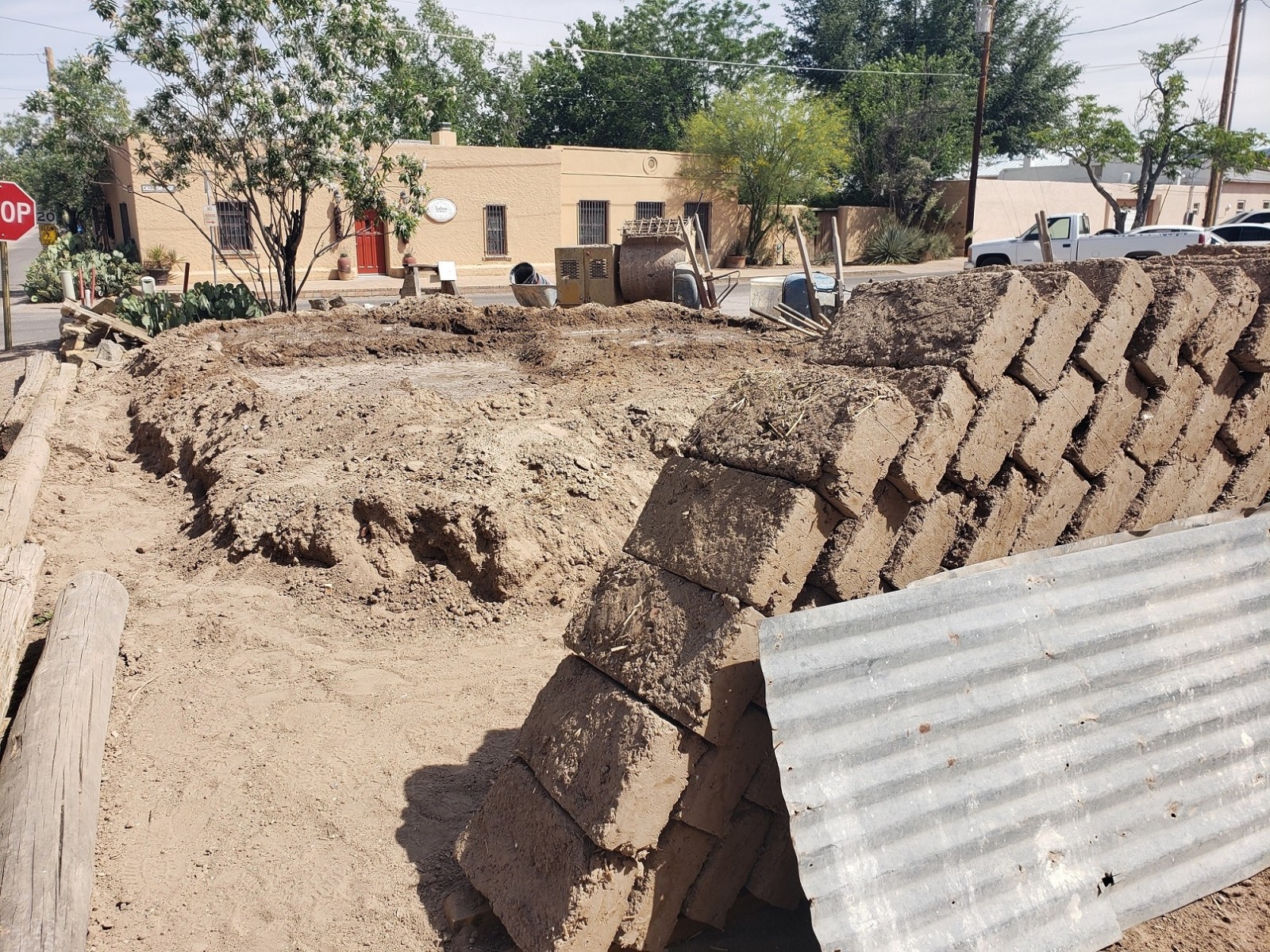 Adobe bricks used in the preservation of the Taylor-Mesilla Historic Property drying at the site during a preservation workshop held in 2019 in partnership with the New Mexico Humanities Council.